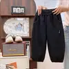 Temporada de Regreso a Clases Pantalones para Niños Estilo Primavera y Otoño Niñas Estilo Coreano Pierna Curva Pantalones Casuales Niños Versátil Puño Elástico Pantalones Largos Venta al por Mayor