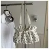 Bolso de axila negro de lunares para mujer 2026 nuevo de moda de alta gama ligero de nicho para ir al trabajo de gran capacidad