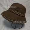 Sombrero de pescador a cuadros estilo coreano para otoño e invierno, con un diseño pastoral estilo ins, casual y moderno, hace que la cara se vea más pequeña y proporciona calor - un elegante sombrero de pescador