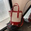 Sucesso transfronteiriço de 2025: bolsa balde color block, bolsa de ombro versátil, bolsa transversal, bolsa para o dia a dia, estilo minimalista urbano e de alta qualidade