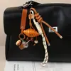 Colgante Creativo Estilo Ins para Pan de Agua Alcalina Colgante Miu Moda Versátil Elegante Colgante para Bolso Llavero para Mujeres