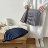 Oferta de Liquidación de Stock Falda plisada para niña Primavera/Otoño 2026 Falda corta estilo universitario para niños Falda para niña pequeña Gris