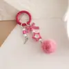 Nueva Cadena Creativa de Bola de Pelo para Teléfono Móvil Cadena de Bola de Pelo Hecha a Mano con Cuentas DIY Caja Sorpresa Cadena Colgante Linda Llavero