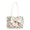 Bolso tote de ante con lunares y lazo de estilo coreano de moda para mujer, nuevo y moderno 2026, versátil, de gran capacidad, para llevar bajo el brazo