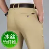 Nuevos pantalones casuales de negocios de seda helada para otoño para hombre, pantalones de hombre de fibra de bambú verde militar, pantalones de traje rectos holgados para mediana edad