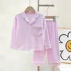 Novos Pijamas de Algodão Outono Conjunto Cardigan com Lapela para Crianças Médias e Grandes Manga Longa Roupas de Casa A-Class Cor Sólida Roupa Infantil Venda por Atacado
