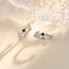 Clips para orejas de estrella negra de circonio microincrustado, aretes elegantes y de moda sin perforación, mini puños para orejas de pentagrama