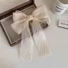 Super hada francés chifón lazo tocado horquilla grande femenina clip de resorte horquilla para la parte trasera de la cabeza tocado amarillo flor sirena Ji