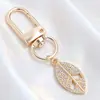 Lujo Ligero Chapado en Oro Charms Completos de Diamante Cierre de Langosta Forma D Colgante Triangular Redondo Accesorios para Llaves Fábrica de Origen Venta al por Mayor