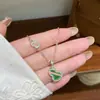 Collar con Colgante de Calabaza de Circonita Microincrustada Hueca Versátil, Moderna y Exquisita, con Cadena de Clavícula Nicho de Lujo Ligero de Alta Gama