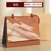 Calendario 2027 Estilo Chino Estampado en Caliente Calendario Mensual Adorno de Escritorio Creativo Anillado Tarjeta Perforada Planifica el Calendario de Hoy Logo Personalizado