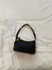 Bolsas de nicho de alta gama para mujer 2026 nuevo de moda otoño popular moda bolso de un solo hombro casual versátil bolso de axila