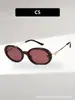 Novos óculos de sol americanos retrô de armação pequena oval com design torcido inspirado na Chanel, oferecendo um visual de luxo leve e elegante, adequados para viagens de carro à beira-mar e uso versátil