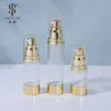 Botella de loción al vacío de 15/30/50 ml, transparente dorada AS tipo prensa dispensador de loción esencia botella al vacío al por mayor