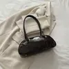 Bolso de axila 2026 otoño diseño de nicho versátil ins alta estética color liso elegante bolso de hombro popular este año para mujeres