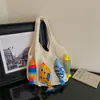 Bolsa tejida de gran capacidad para mujer, nuevo diseño de moda 2026, estilo nicho, bolso de hombro versátil, casual y ligero, perfecto para llevar bajo el brazo