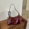 2026 Nueva Bolsa de Albóndiga de Personalidad Retro Estilo Coreano Simple Gran Capacidad Monocarga Hombro Axila Bolso Cruzado Texturizado