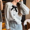 Cárdigan de punto patchwork estilo coreano con cuello de muñeca para mujer, transfronterizo 2026, otoño e invierno, suave y elegante, juvenil y dulce, con un ambiente casual
