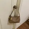 Nuevo bolso de axila de nicho 2026, bolso tipo almohada minimalista y elegante, bolso de hombro versátil, bolso cruzado simple, moderno