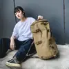 Mochila de Lona Retro de Gran Capacidad Transfronteriza Tendencia de Moda Bolso Escolar para Estudiante Mujer Mochila para Viaje de Negocios de Hombre Montañismo