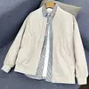Transmisión en vivo de comercio electrónico transfronterizo: Ropa exterior casual estilo americano para primavera y otoño, chaqueta bomber de moda para parejas, chaqueta de béisbol, artículo más vendido