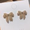 Pendientes elegantes de Dongdaemun coreanos con microincrustaciones de circonita y lazo, de plata S925, con exquisita aguja de diamantes, ideales para combinar con todo tipo de mujeres.