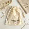 Bolsas ligeras de fibra de bambú con cordón para joyería, coleccionables y productos de fragancia; Impresión de logo personalizada disponible para empaques de regalo de marca