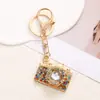 Llavero Creativo Estilo Coreano con Cámara de Pedrería y Diamantes Llavero de Coche Colgante de Moda de Lujo Ligero para Bolso de Mujer