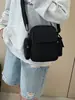 Mochila pequeña casual transfronteriza 2025 nueva popular ligera bolsa para teléfono móvil nailon hombro bandolera comercio exterior