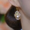 Pendientes de moda con temperamento Joker, flor de circón, champán y perla, diseño de nicho, pendientes nuevos y únicos.