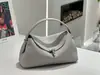 Bolso de mano de cuero de grano superior de comercio exterior, diseño de nicho coreano, bolso tote, bolso de hombro para el trabajo, bolso cruzado, bolso de mano pequeño, bolso de cuero genuino para mujer