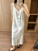 O tamanho foi atualizado. Novo vestido simples estilo coreano com decote U, abotoamento simples, fenda na barra e sem mangas