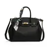Bolsa Satchel de Moda para Comércio Exterior Bolsa Platina para Mulheres 2025 Novas Bolsas de Alta Qualidade Grande Capacidade Lenço de Seda Bolsa de Ombro Único Transversal