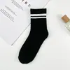 Calcetines Largos de Verano para Mujer Estilo Ins de Moda para Uso en Exteriores Primavera y Otoño de Longitud Media Negros y Blancos Casuales Simples Modernos Versátiles