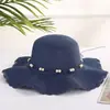 Sombrero de sol con borde ondulado, nuevo sombrero de sol coreano para playa, sombrero de sol de paja hueca, venta al por mayor de fabricantes