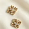 Nuevos colgantes de joyería estilo chino, accesorios de cobre fundido, accesorios para el cabello DIY, collares, piezas de colgante de flor con patrón de nube hueca tradicional