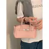 Bolso de Mano para Mujer con Textura Única 2026 Modelo Nuevo de Primavera Bolso Platino Bolso de Hombro Cruzado Simple Mayoreo
