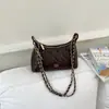 Bolsa de corrente popular estilo coreano com padrão de losangos para mulheres, bolsa de ombro/transversal versátil e fashion, bolsa de alta qualidade estilo bolinho, novo modelo verão 2026