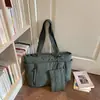 Bolso tote de color liso, estilo suave y relajado, moda coreana para chicas jóvenes, adecuado para el uso diario y salidas de vacaciones, un bolso casual