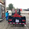 Fabricante de Camión de Basura Removible para Compartimento de Chasis Pesado Sinotruk Haoman Marca Azul Transportador de Residuos de Construcción