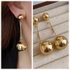 Pendientes de bola de metal brillante con diseño de nicho, únicos, elegantes, de estilo moderno, nuevos pendientes de moda.