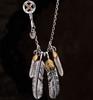 Conjunto de cadena angular Yintai, cadena Yu Wenle del mismo estilo, estilo Gao Qiao Wu, pluma de pino verde, collar largo de plata, cadena de suéter para hombre
