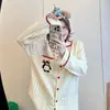 Conjunto de pijama con un lindo bordado de pingüino y diseño a rayas, adecuado para mujeres en primavera y otoño, con mangas largas y pantalones largos, y se puede usar como ropa de estar en casa.