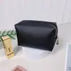 Bolsa de maquillaje de mano de venta caliente transfronteriza bolsa octagonal de color sólido bolsa de aseo portátil para mujer bolsa de almacenamiento de gran capacidad de alto valor