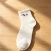 Calcetines de felpa hasta la pantorrilla con bordado de animal de felpa, suaves y amigables con la piel, adecuados para el uso diario, calcetines lindos y de moda para niñas