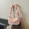 Bolso de axila plisado floral con lazo para mujer, versión coreana de alta estética, bolso de hombro casual versátil, bolso de mano elegante para mujer