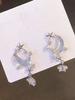 Pendientes con diseño de planeta, atmósfera, luna, colores elegantes y fantasía que cambian de color, con dulces y geniales estrellas.