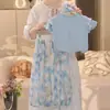 Conjunto de Verão de Seda Gelada para Meninas 2025 Novo Vestido de Verão Estiloso com Mangas Bufantes e Shorts Florais Conjunto de Duas Peças