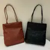 Bolsa de Palha Minimalista para Mulheres 2025 Nova Outono Bolsa de Ombro de Nicho de Luxo Bolsa Tote para o Dia a Dia em Pele de Cabra Importada