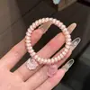 Nuevo estilo ins fresco y lindo conejo de dibujos animados de fresa cordón para teléfono alta elasticidad dulce y adorable scrunchie para mejores amigos